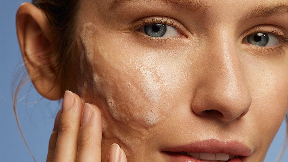 woman applying Deep Cleansing Gel